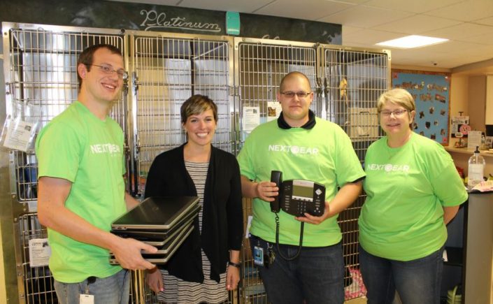 NextGear Capital team members present donations to the Humane Society of Hamilton County